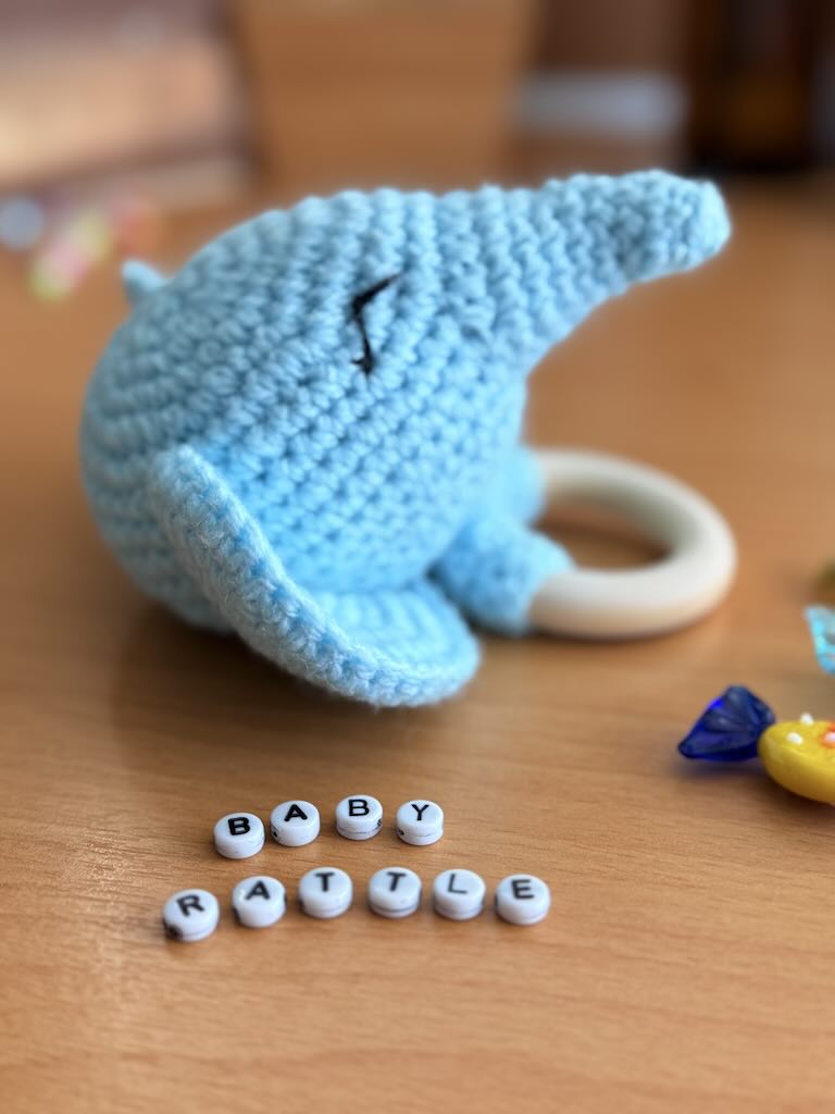 handmade crochet blue elephant baby rattle with soft ears and gentle sound