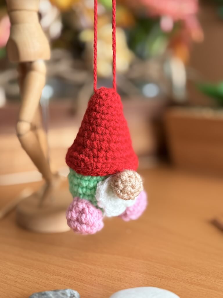 handmade crochet christmas gnome with red hat and white beard