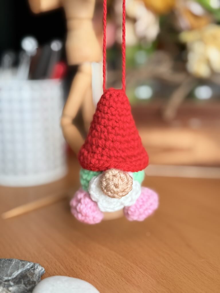 handmade crochet christmas gnome with red hat and white beard