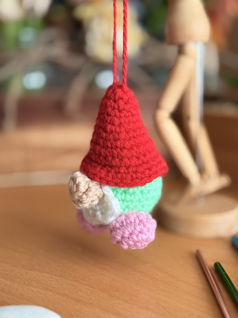 handmade crochet christmas gnome with red hat and white beard