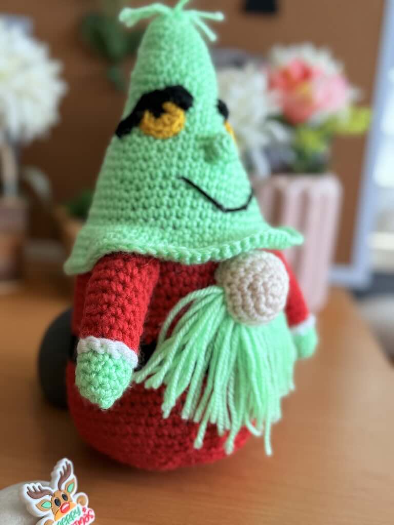 handmade crochet Grinch Santa gnome with green hat and red body