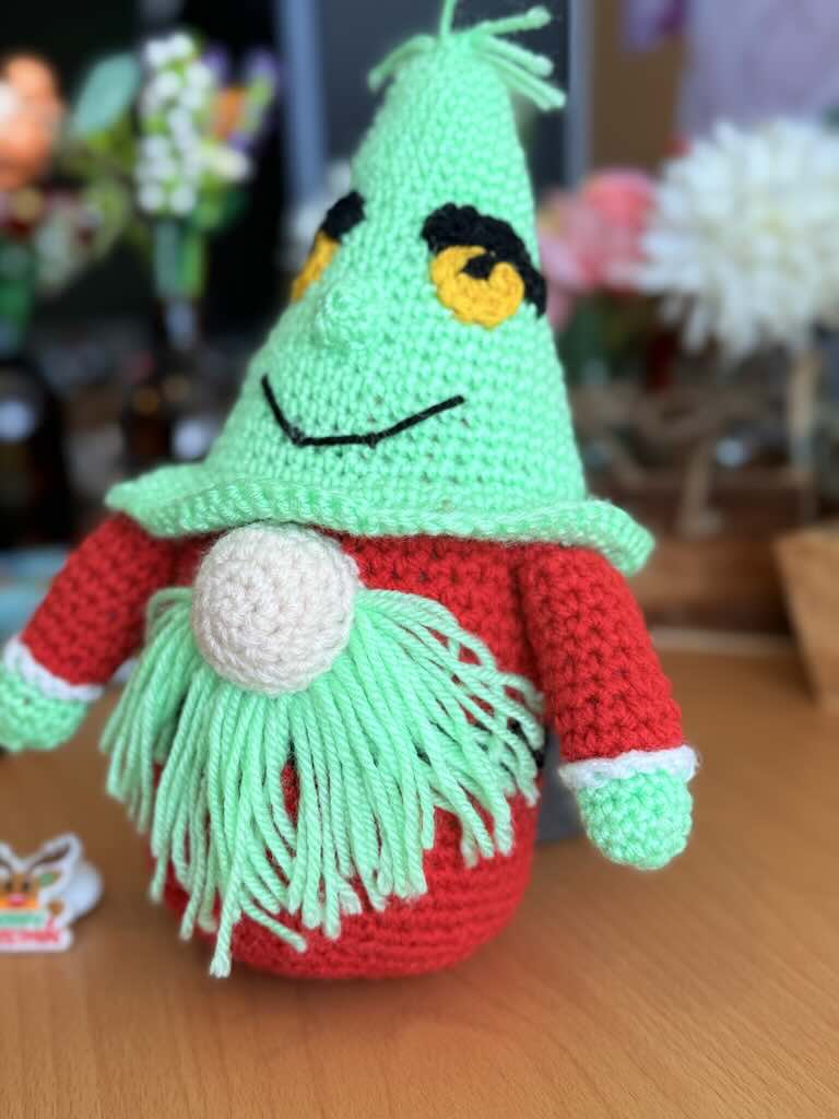 handmade crochet Grinch Santa gnome with green hat and red body
