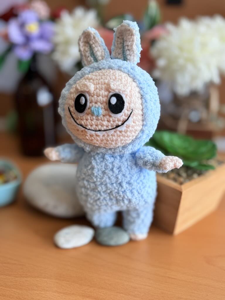 handmade crochet Lafufu toy with bright colors and playful design