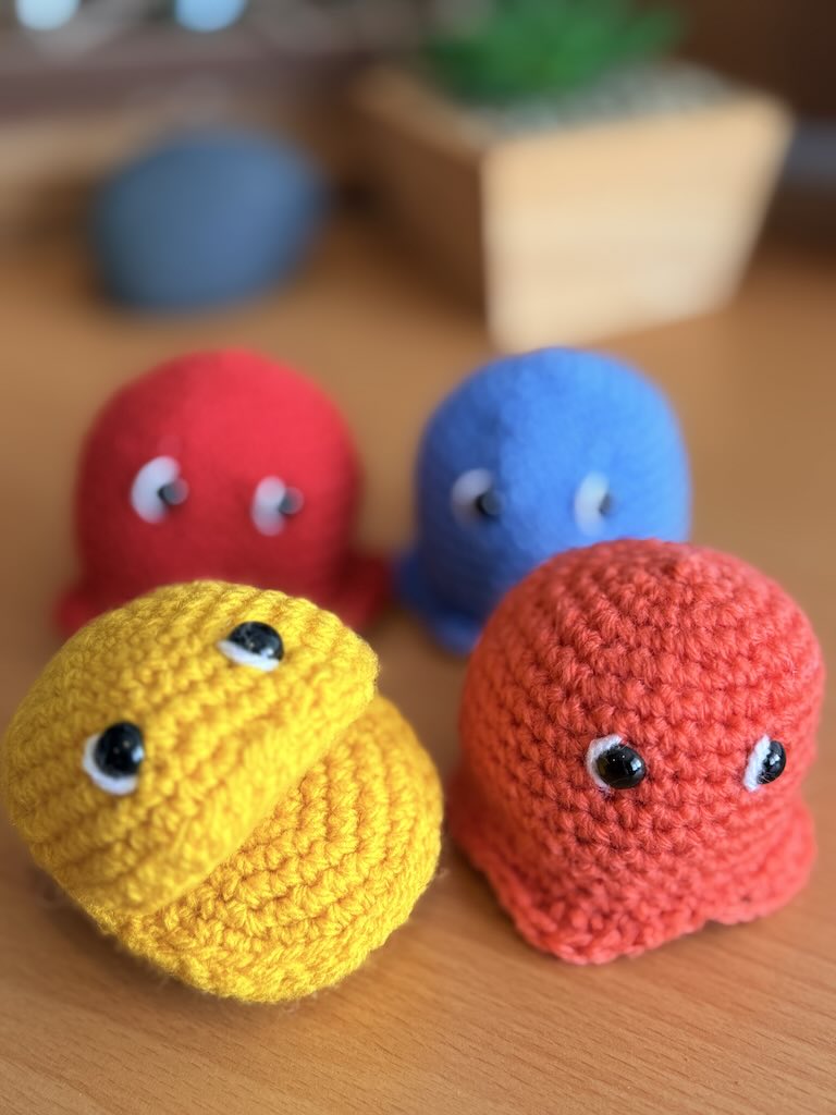 handmade crochet Pac-Man character toy with classic yellow design and Ghosties