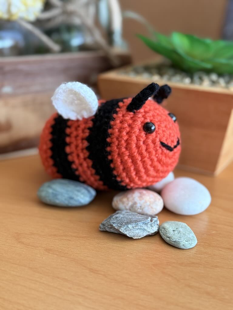handmade crochet little bee with bright orange and black stripes