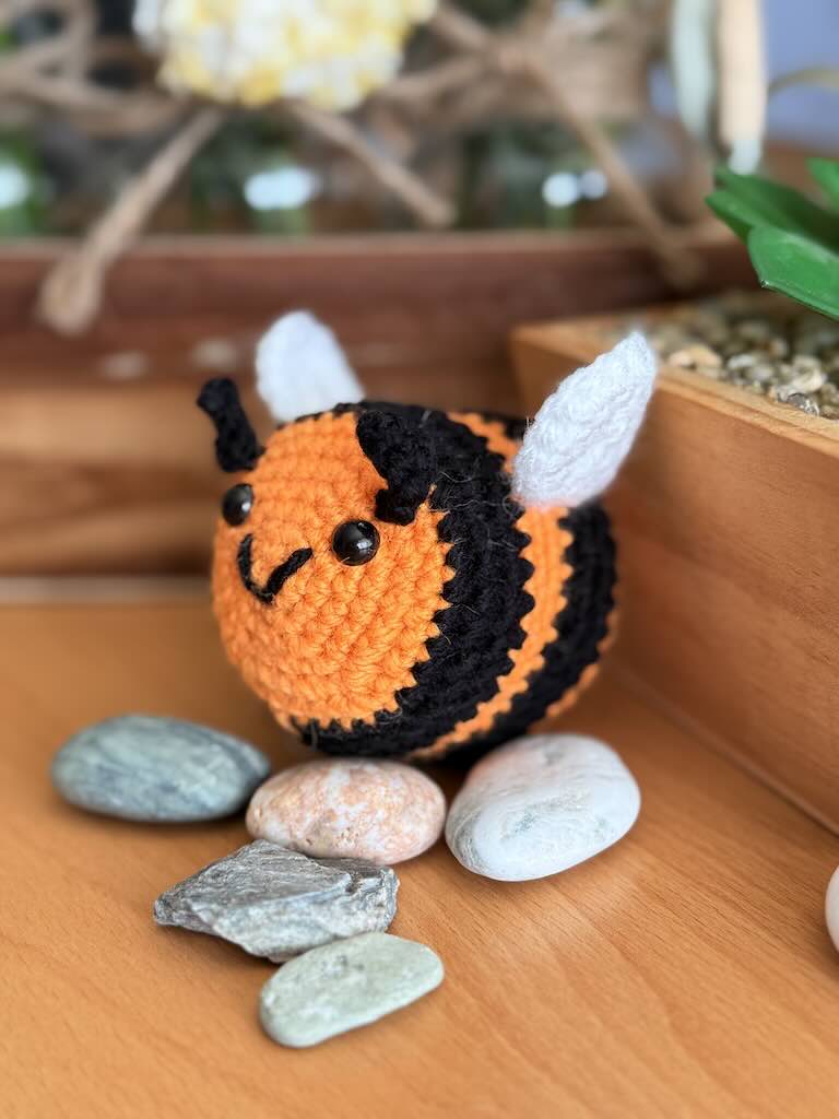 crochet little bee with orange and black stripes