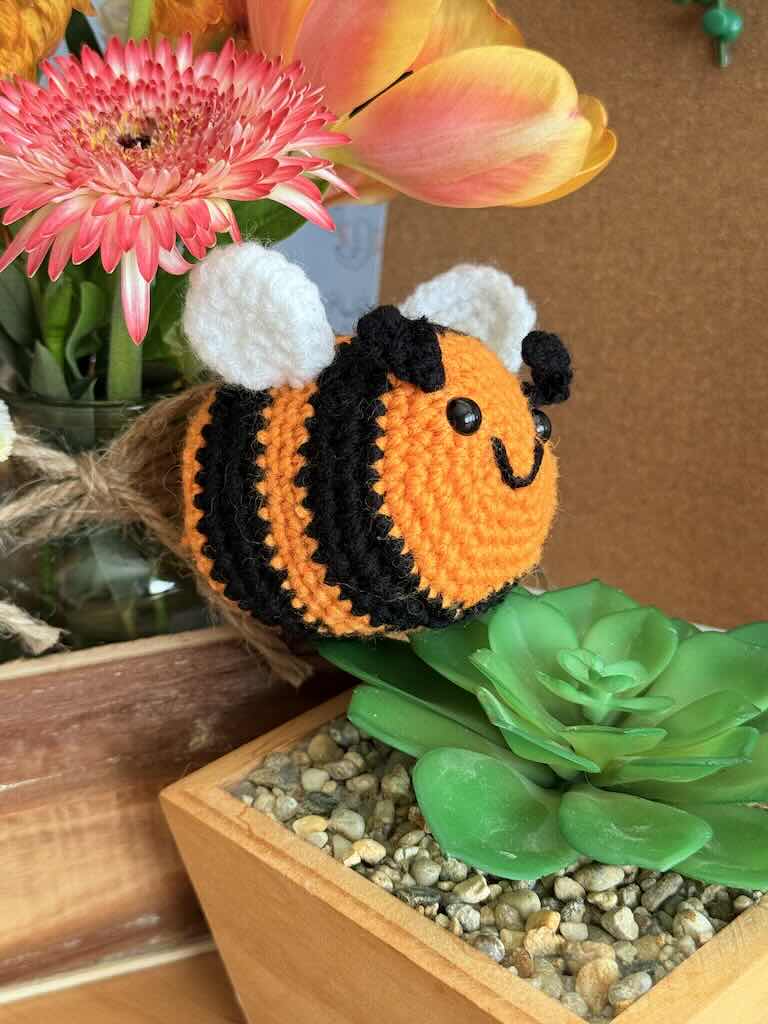 crochet little bee with orange and black stripes
