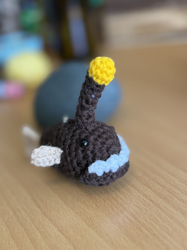 keychain crochet anglerfish toy with small light lure and dark body
