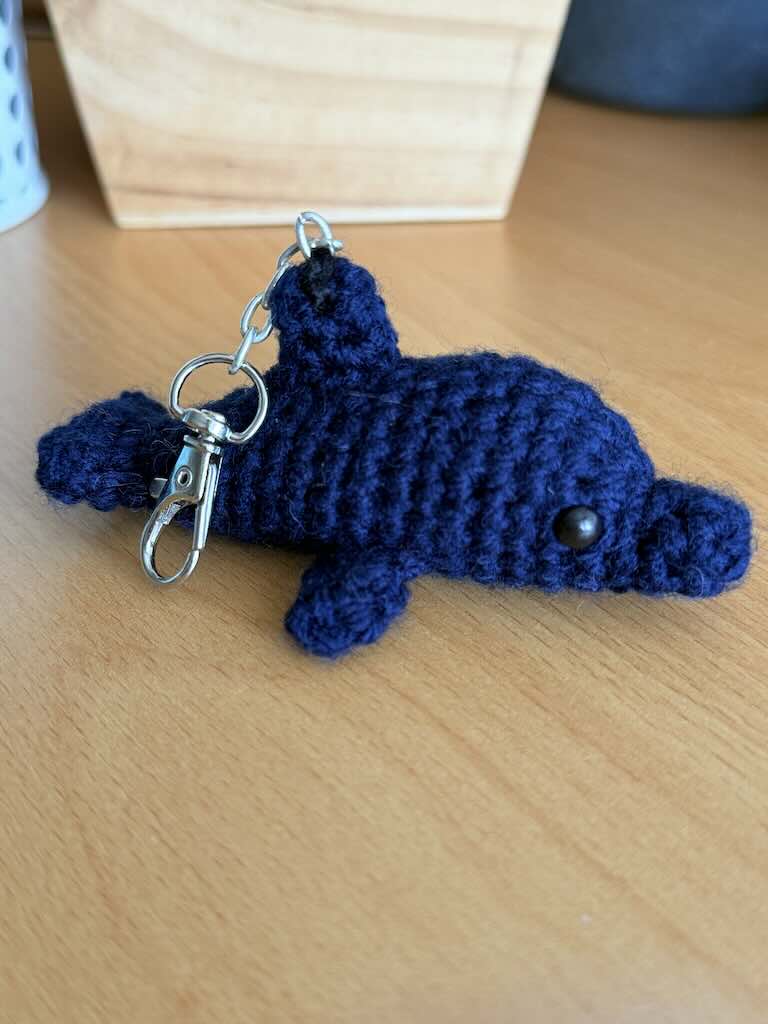 keychain handmade crochet dolphin toy with curved body and soft fins