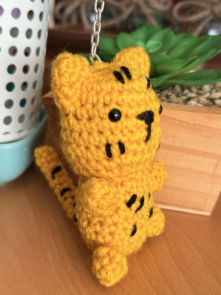 keychain crochet leopard toy with yellow and black spots