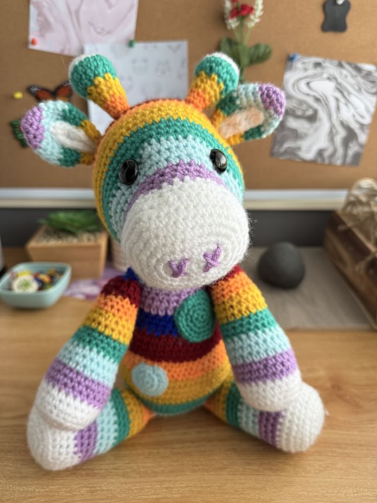handmade crochet rainbow-coloured zebra