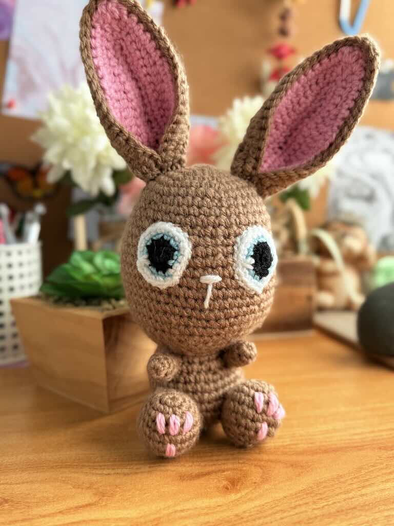handmade crochet bunny toy named Flopsy with floppy ears and big eyes