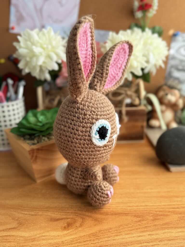 handmade crochet bunny toy named Flopsy with floppy ears and big eyes