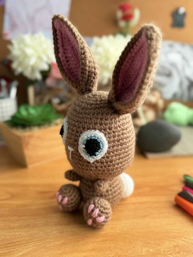 handmade crochet bunny toy named Flopsy with floppy ears and big eyes