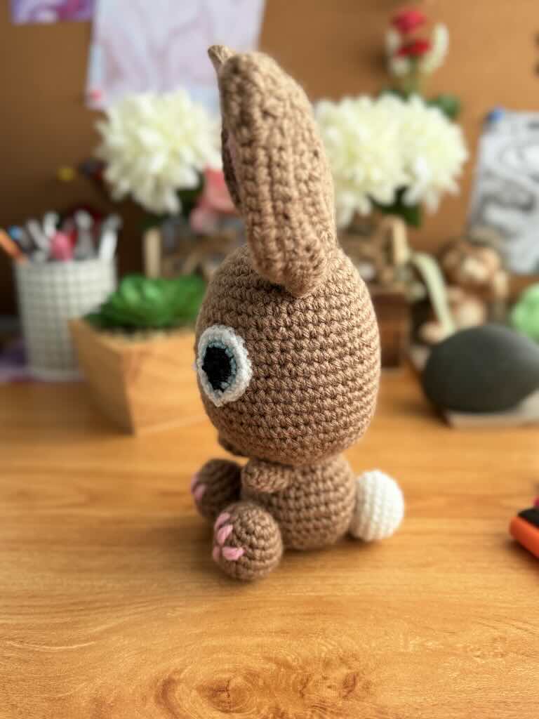 handmade crochet bunny toy named Flopsy with floppy ears and big eyes