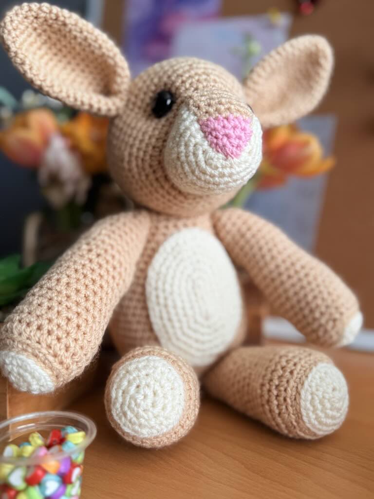handmade crochet light-brown rabbit toy with long ears and gentle face